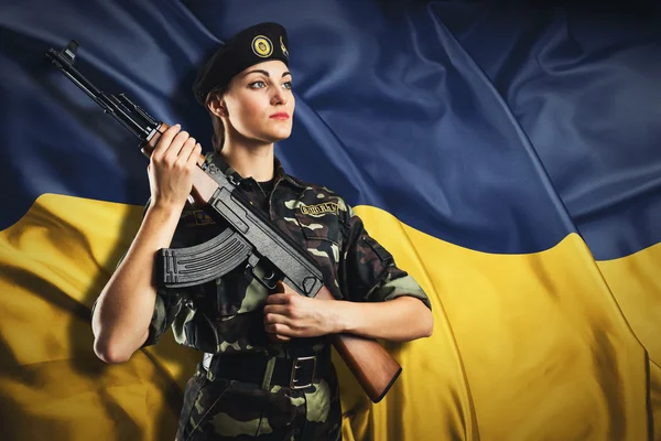 Menina em uniforme militar — Fotografia de Stock