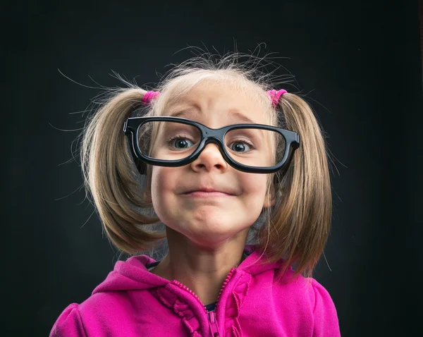 Little girl in   big spectacles — Stock Photo, Image