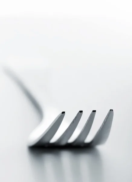 Silver fork on white — Stock Photo, Image