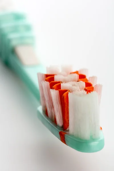 Cepillo de dientes en blanco —  Fotos de Stock