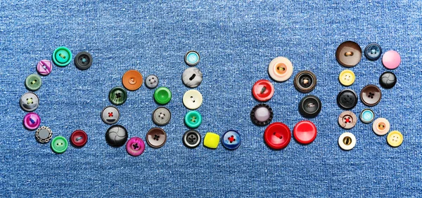 Colorful buttons forming the word 'color' — 图库照片
