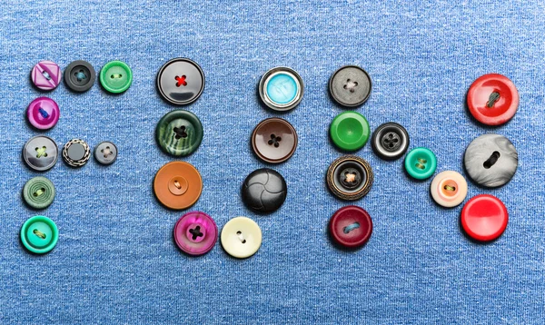 Botones coloridos que forman la palabra 'divertido' — Foto de Stock