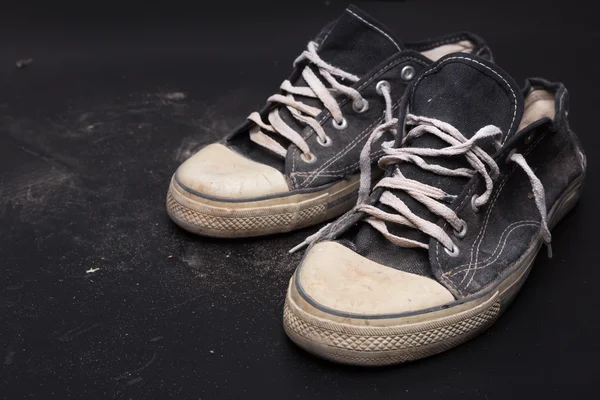 Sports trainers on the floor — Stock Photo, Image