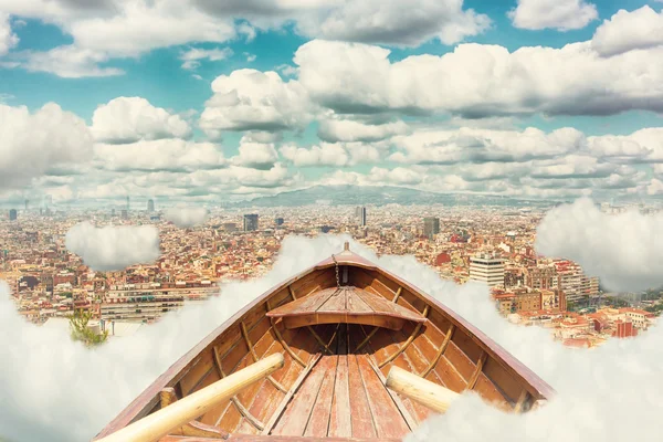 Vintage wooden boat in clouds — Stock Photo, Image