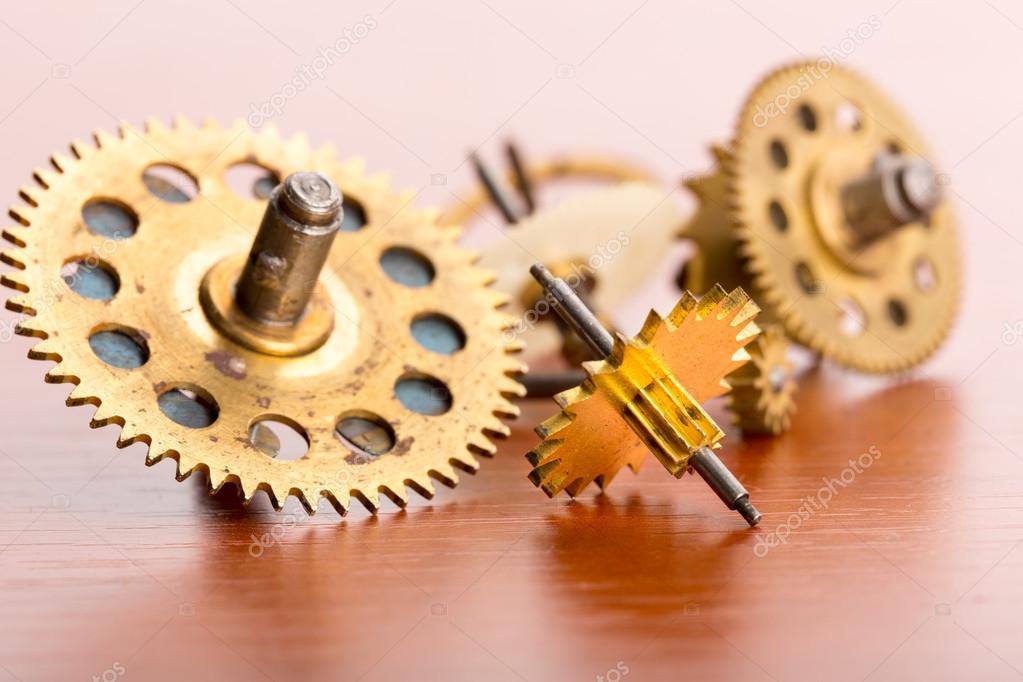 Gears on wooden table