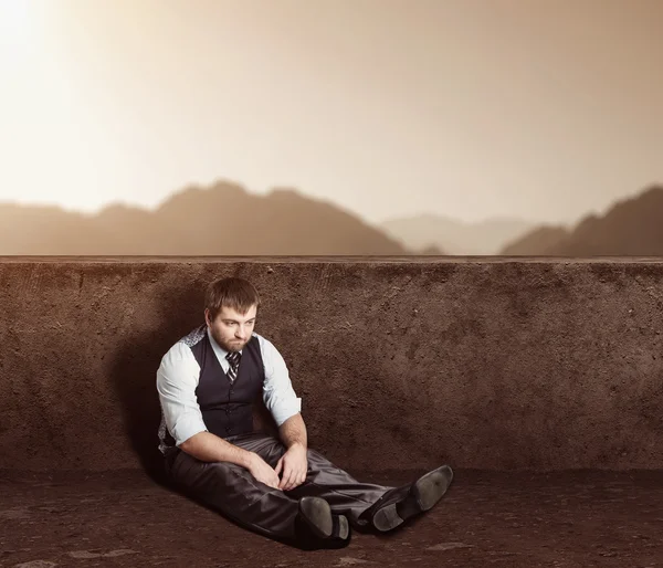 Man sitting on the floor — Stock Photo, Image