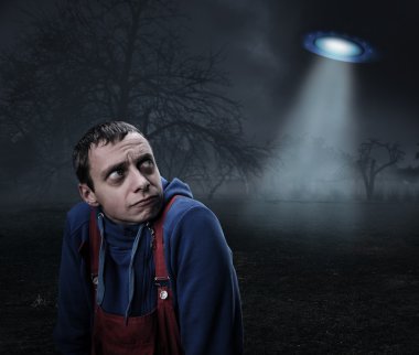 Guy scared by UFO clipart