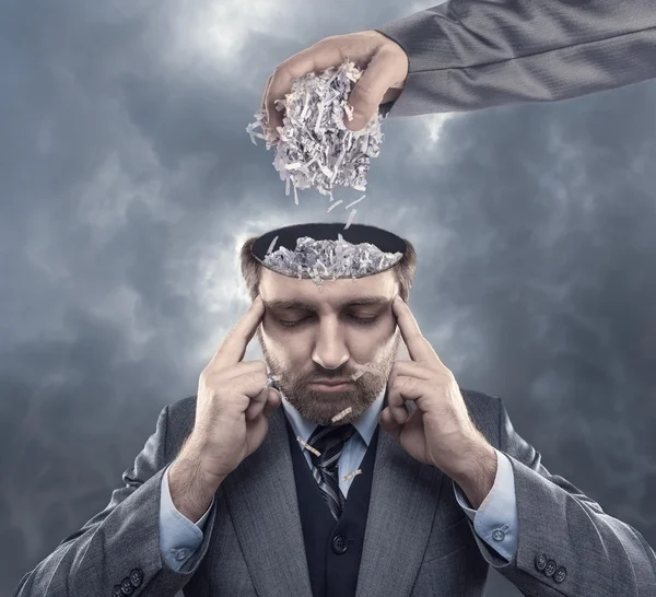 Man with paper in his brain — Stock Photo, Image