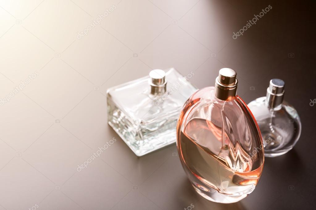 Three bottles of perfumes