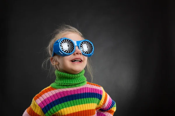 Little girl in party glasses — Stock Photo, Image