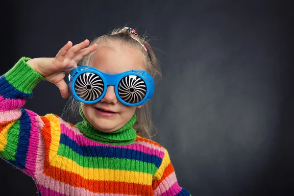 Little girl in party glasses — Stock Photo, Image
