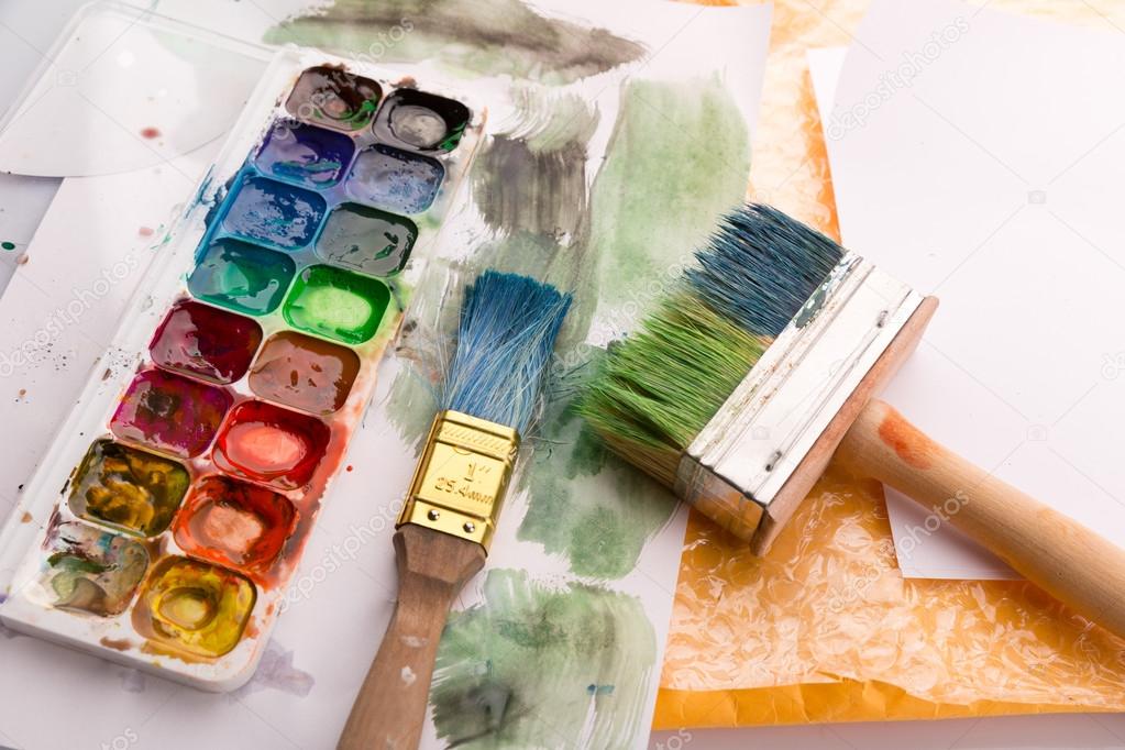 Paintbrushes and courful palette