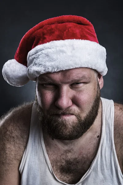 Homem pensativo em chapéu de Papai Noel — Fotografia de Stock