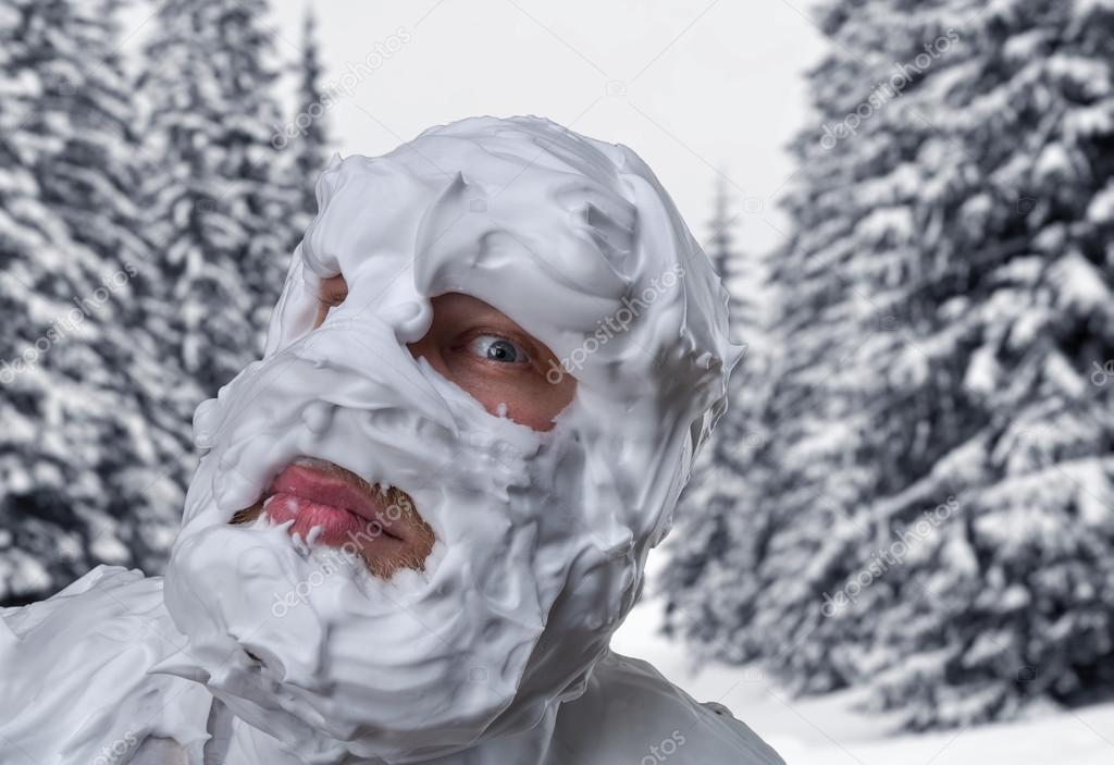 Man with shaving foam on his head