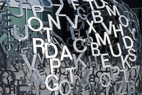 Varias letras metálicas — Foto de Stock