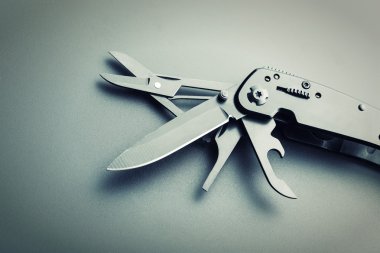 Opened multitool knife clipart
