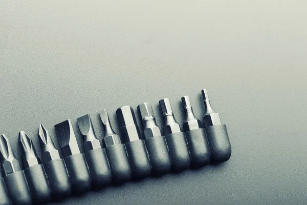 Bits de chave de fenda em cinza — Fotografia de Stock
