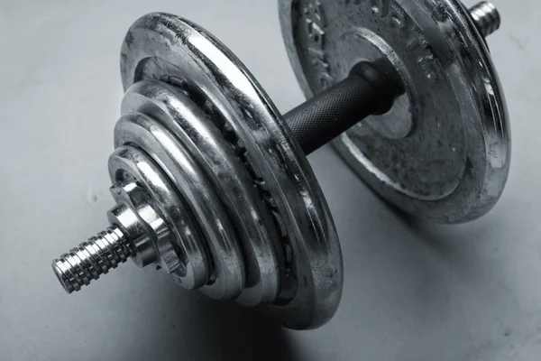 Old steel dumbbell — Stock Photo, Image