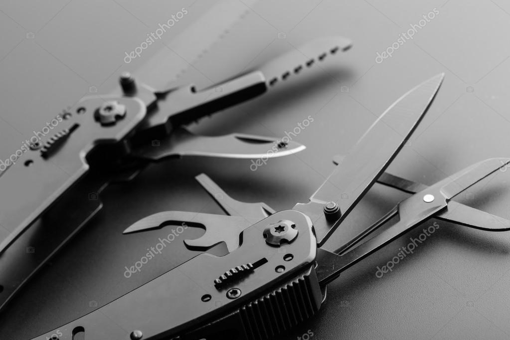Opened multitool knife Stock Photo by ©Nomadsoul1 69590615