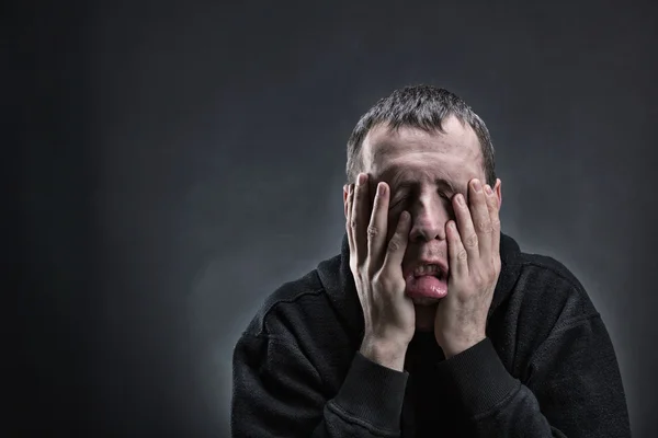 Man with palms on  cheeks — Stock Photo, Image