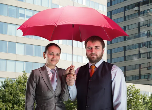 Equipo de negocios bajo paraguas — Foto de Stock