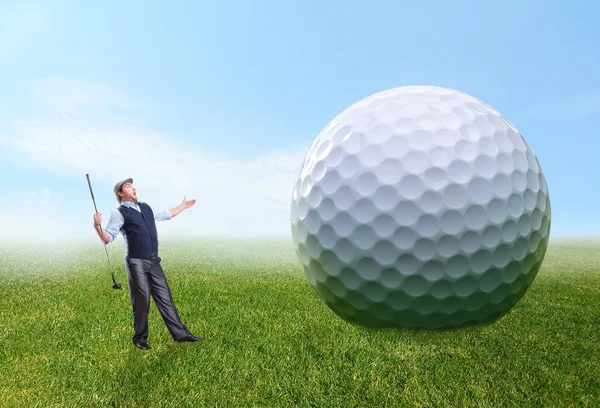 Golfer with golf ball — Stock Photo, Image