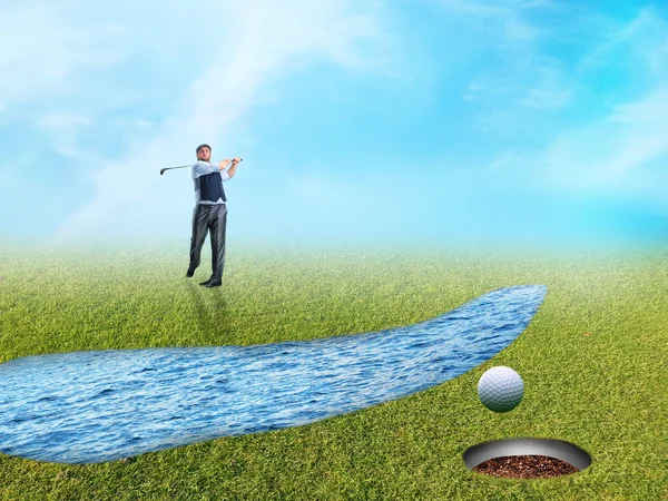 Businessman plays golf — Stock Photo, Image