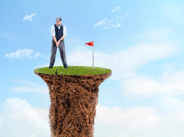 Businessman playing golf — Stock Photo, Image