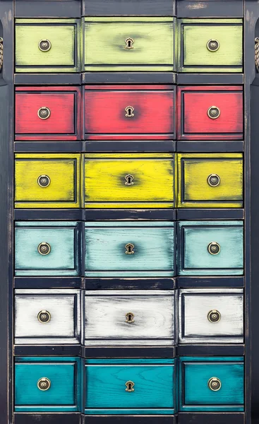 Cupboard with multicolored drawers — Stock Photo, Image