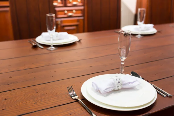 Served table with plates — Stock Photo, Image