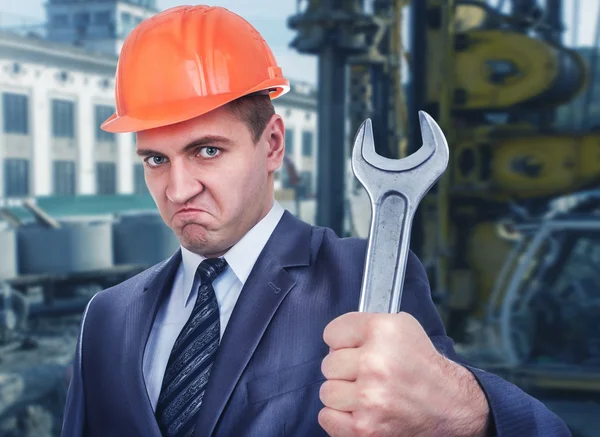 Engineer with spanner in hand — Stock Photo, Image