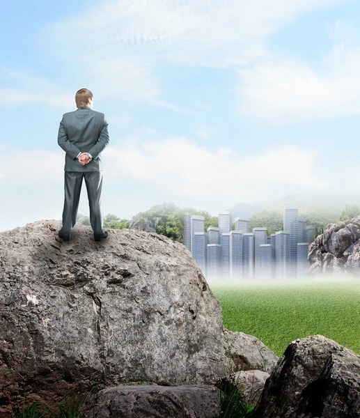 Businessman  looking at the city — Stock Photo, Image