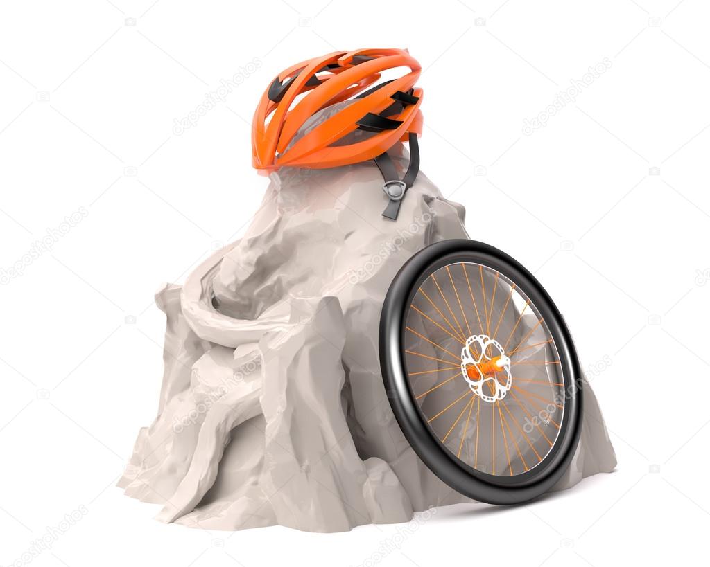 Helmet and wheel in mountains