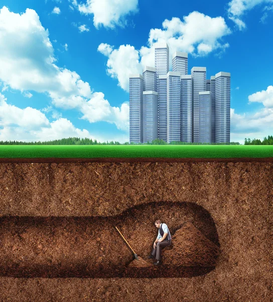 Businessman has  rest while digging tunnel — Stockfoto
