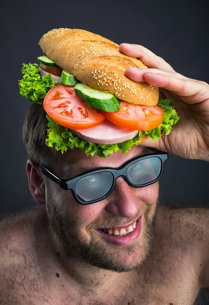 Hombre feliz con sándwich —  Fotos de Stock