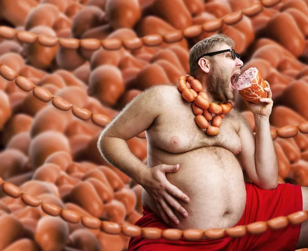 Fat man with sausages — Stock Photo, Image