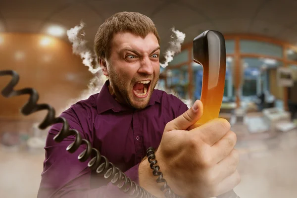 Business man screaming with phone — стоковое фото