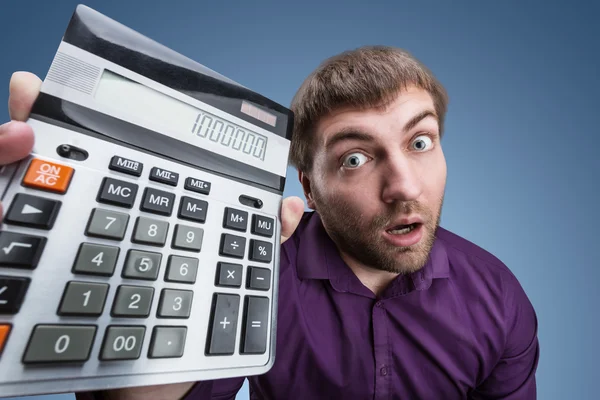Człowiek gospodarstwa kalkulator — Zdjęcie stockowe