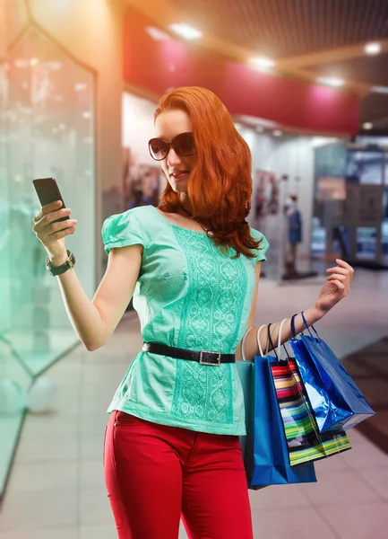 Woman with shopping bags — Stock Photo, Image