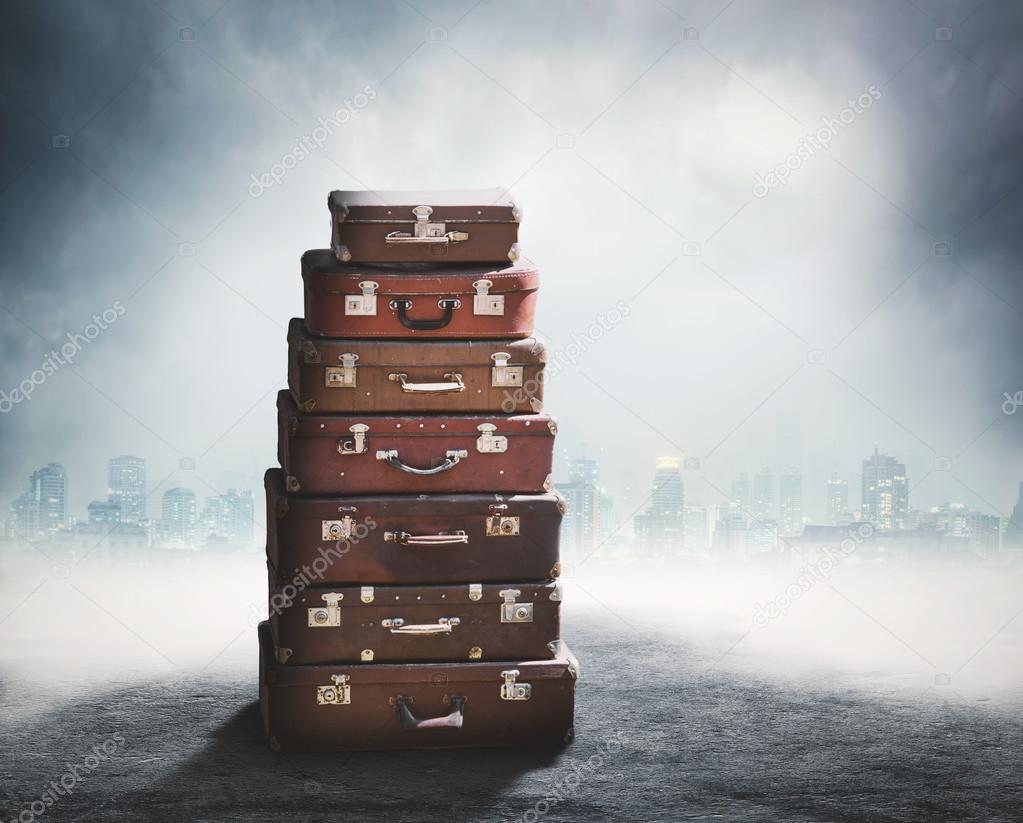 Stack of old brown suitcases