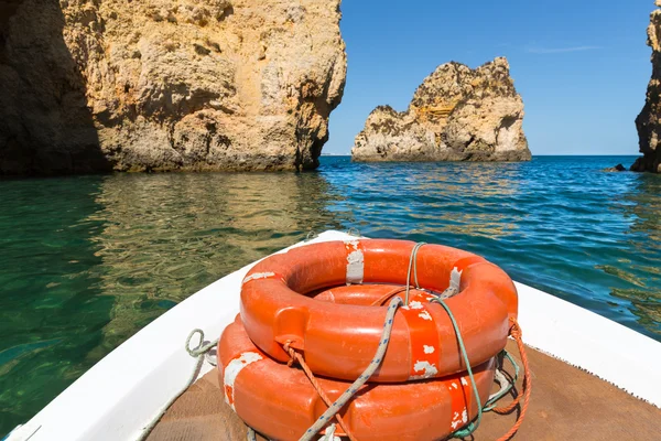 Close up of lifebuoys over sea — Stock Photo, Image