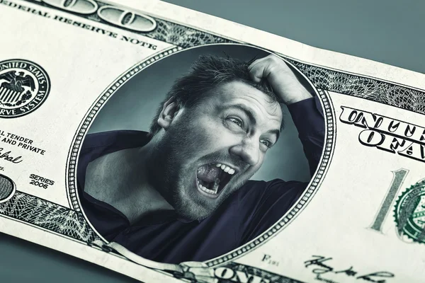 Angry man in the dollar banknote — Stock Photo, Image