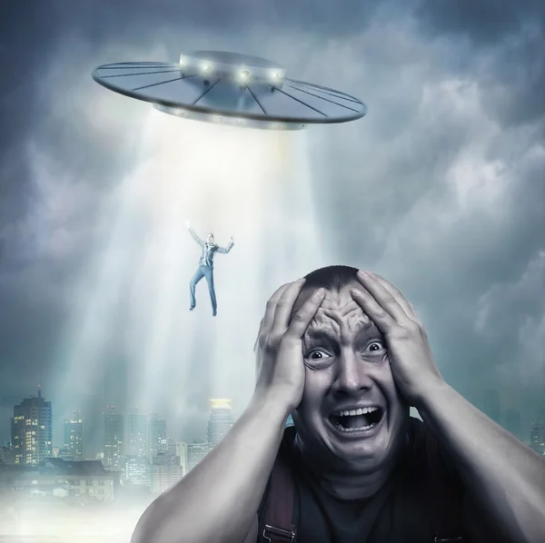 Scared by UFO man Stock Picture