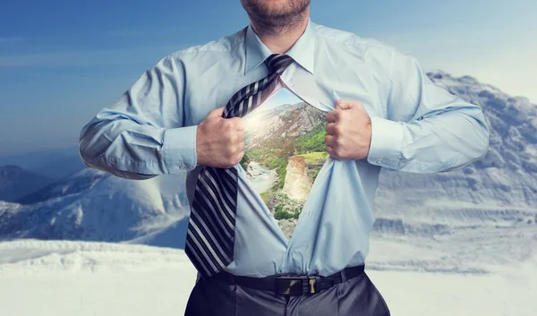 Empresário com montanhas dentro — Fotografia de Stock