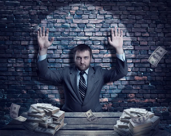 Businessman with raised hands and money — Stock Photo, Image