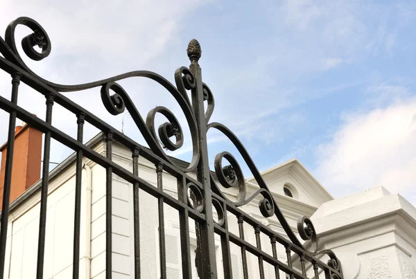 Black wrought iron gate — Stock Photo, Image