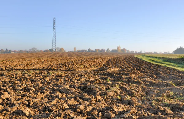 Campo arado bajo el sol —  Fotos de Stock