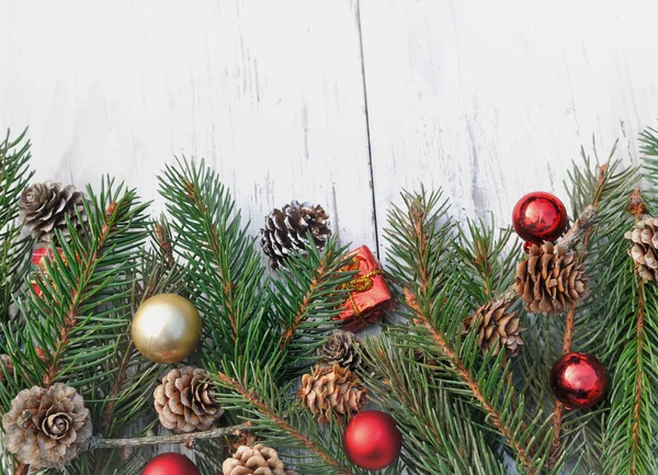 Christmas decoration on fir branches — Stock Photo, Image