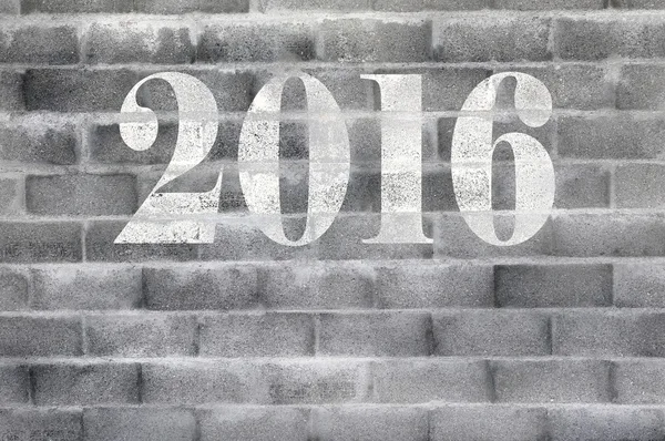 2016 tag på cinderblock vägg — Stockfoto
