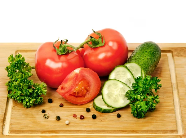 Tomaten und Gurken — Stockfoto